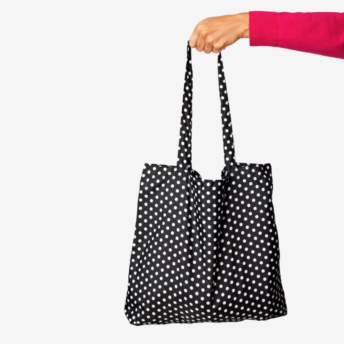 Borsa pieghevole nera con pois